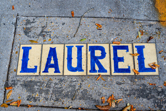 Traditional Laurel Street Sidewalk Sign in Uptown Neighborhood in New Orleans, Louisiana, USA