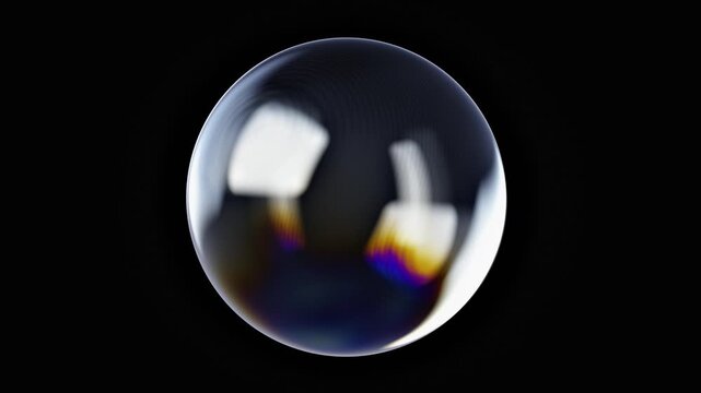 Soap bubble floating with colorful reflections on black background