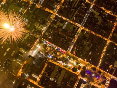 Aerial view of fireworks exploding over the city streets during Independence Day celebrations in Uruapan, Michoacan, Mexico.