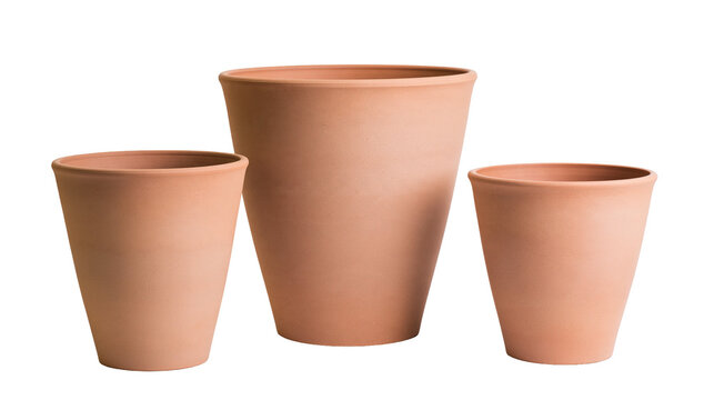 Isolated three empty terracotta clay plant pots in various sizes, classic garden planting items