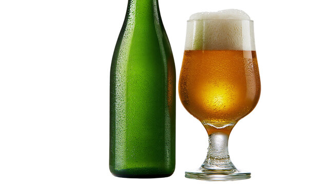 Isolated refreshing cold beer in a green bottle next to a condensation-covered glass of lager