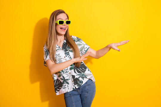 Beautiful Young Woman with Stylish Fashion in Trendy Summer Shirt Posing Cheerfully Against Yellow Background