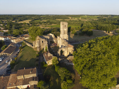 FRANCE. GIRONDE 33 ENTRE-DEUX-MERS, AERIAL VIEW OF THE ABBEY OF LA SAUVE-MAJEUR UNESCO WORLD HERITAGE SITE. SILVA MAJOR FESTIVAL