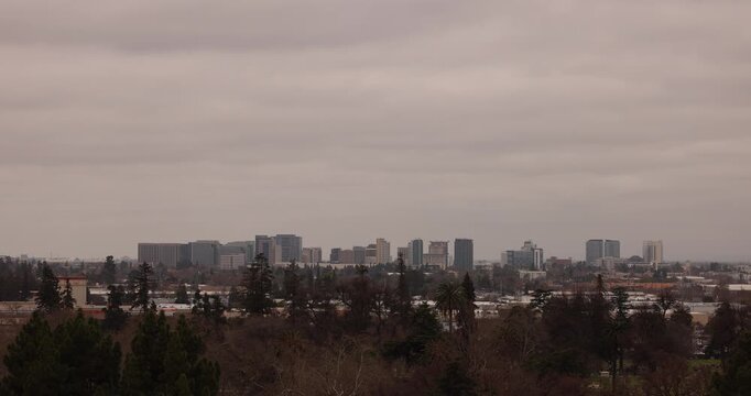 A winter storm passes over the downtown skyline of San Jose, California, USA.