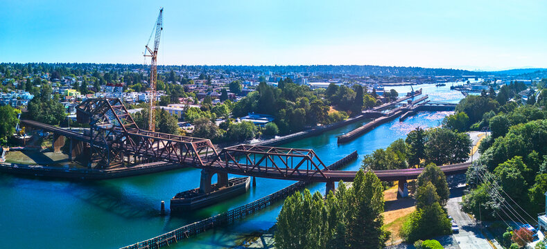 Aerial Seattle Train Bridge Ballard Fish Ladder and Urban Waterway Panorama