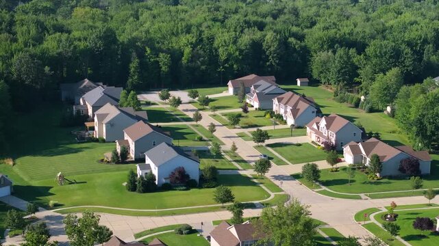 Aerial view of large private homes in Cleveland, Ohio residential area. New family houses as example of real estate development in USA suburbs.