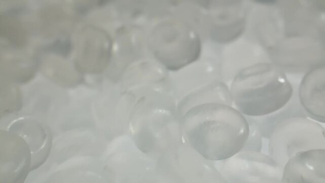 Bubble wrap plastic film texture extreme close up macro, clear air bubbles packaging background for moving, shipping and ecommerce