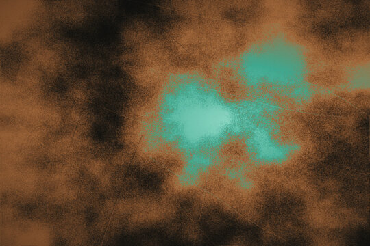 Abstract grunge background featuring a textured brown and black smoky pattern with vibrant turquoise and teal light source highlights in center.