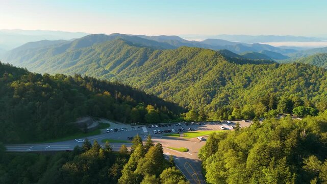 Car travel in Great Smoky Mountains. Newfound Gap overlook parking in in summer. Mountain pass along the border of Tennessee and North Carolina.