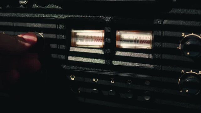 Tape audio music player, VHS studio magnetic tape, vintage retro spool reel to reel player and recorder, magnetic tape data storage close up, music studio. 