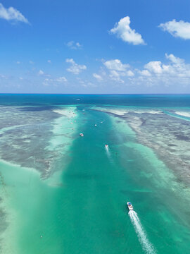 Boats heading to the popular Islamorada Sandbar through the Whale Harbor Channel at Islamorada in the Florida Keys