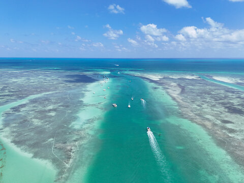 Boats heading to the popular Islamorada Sandbar through the Whale Harbor Channel at Islamorada in the Florida Keys.	