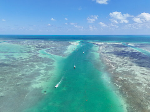 Boats returning back from the ocean through Whale Harbor Channel at Islamorada in the Florida Keys.