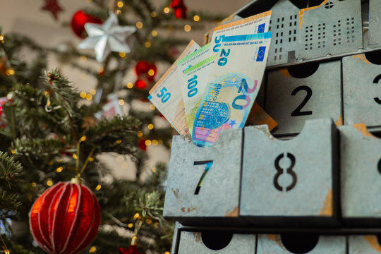 Christmas money.Euro Banknotes in Metal Christmas Advent Calendar.holiday savings