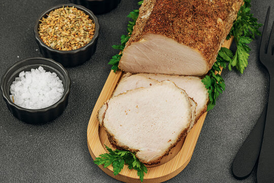 High-protein roasted pork loin served with tasty sauces, styled for food photography