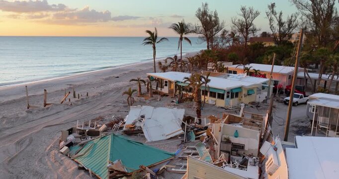 Destroyed houses on ocean coast. Hurricane Milton consequences in Englewood, Florida. Storm surge severe damage.