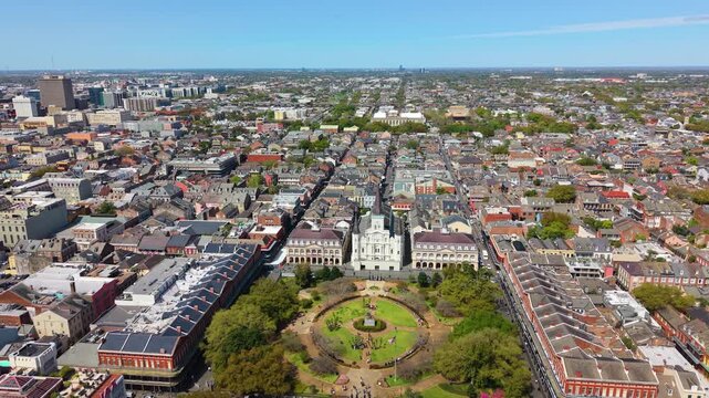 French Quarter in New Orleans, Louisiana with St Louis Cathedral, Jackson Square and Bourbon Street near Mississippi River. Vibrant cityscape blends historic charm with contemporary urban development.