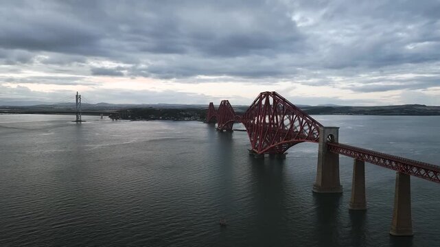 Forth Bridge from a drone, Queensferry Crossing, Forth Estuary, Scotland, United Kingdom