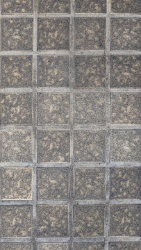 Stone tile pattern in gray tones, textured mobile wallpaper.