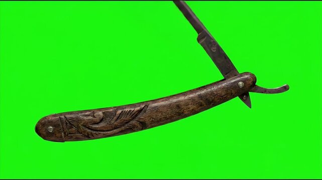 Cinematic 4K Vintage Straight Razor Folding and Unfolding on Green Screen Background for Horror Movie and Spooky Halloween Scenes