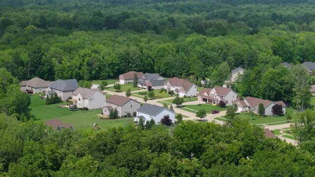 View from above of residential houses in living area in Cleveland, Ohio. American dream homes as example of real estate development in US suburbs.