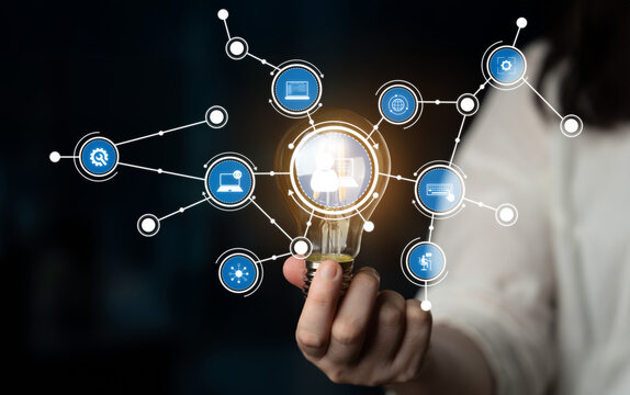 A captivating image showcasing a light bulb as a symbol of innovative ideas, connected to various digital icons illustrating the network of modern technology and communication. Crux