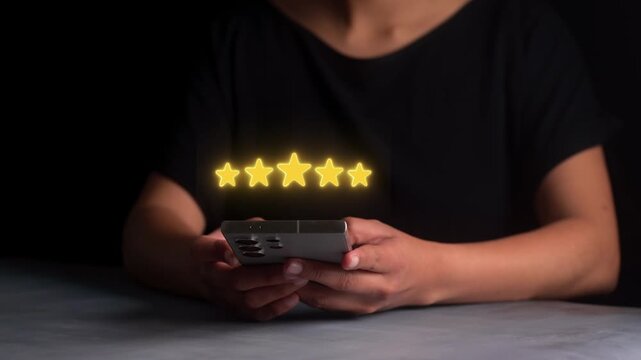 Customer giving five star rating on smartphone screen, customer satisfaction and feedback concept