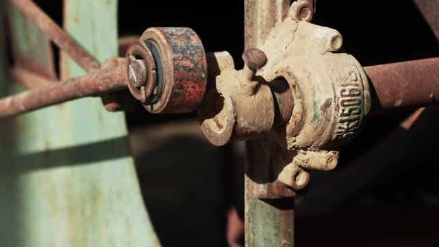 Close up of rusty industrial mechanical connection parts and components