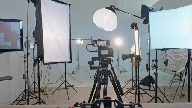 Professional video production camera setup on dolly track