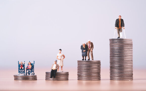 Medical inflation concept with patients and healthcare figures on rising coin stacks symbolizing increasing medical costs, healthcare expenses, insurance burden and financial pressure on families.
