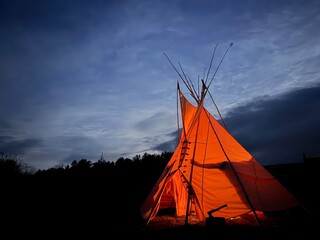 Glowing Tipi Tent Under the Evening Sky © M1