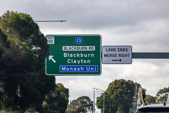 Green overhead freeway exit directional sign for Exit 10 along Monash Freeway indicating Blackburn Road, Clayton, and Monash University in Melbourne, Victoria, Australia