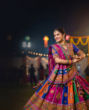 Navratri celebration Navratri festival celebration with beautiful Indian woman dancing traditional Garba