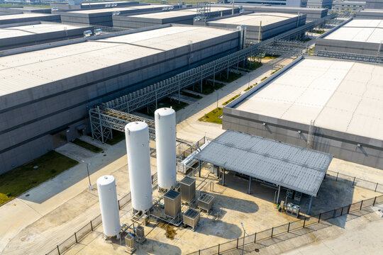 Industrial park featuring liquefied gas storage tanks and factory facilities with pipelines and steel structures