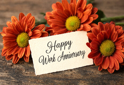Bright orange flowers with happy work anniversary greeting card message