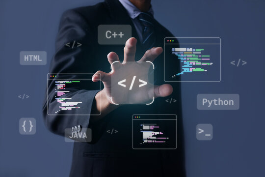 Business Person Reaching Hand Forward Towards Digital Software Development Interface Graphics