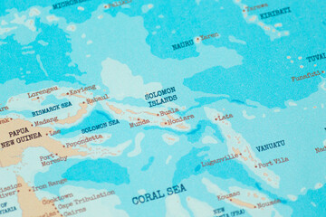 Close up view of solomon islands on a vintage political world map © Alejandro Bernal