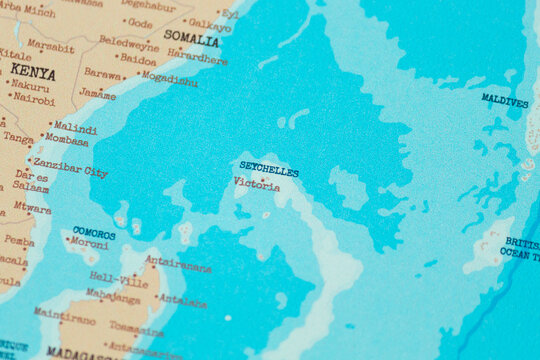 Close up view of seychelles on a vintage political world map