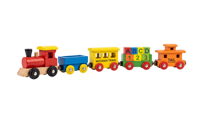 Colorful wooden toy train set with educational alphabet and number blocks, isolated toy locomotive and train cars for childhood play