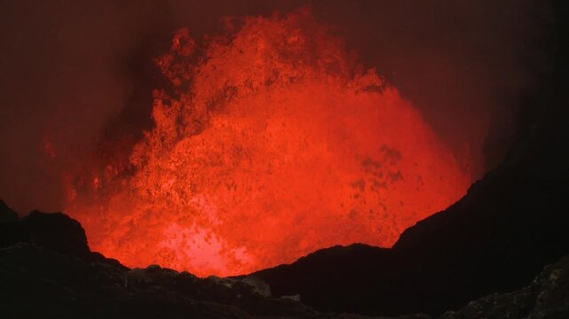 Glowing Lava Lake Erupts Inside Volcanic Crater