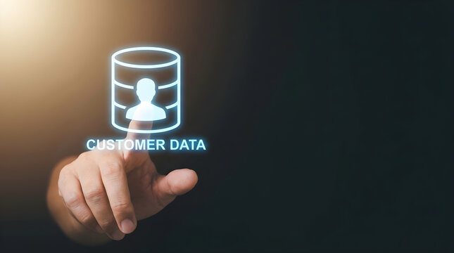 Person touching glowing customer database icon on dark digital interface