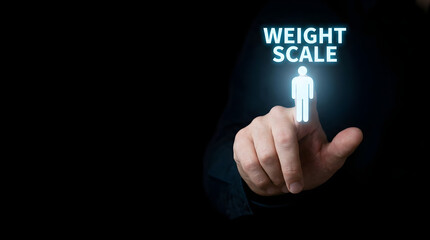 Obraz premium Person touching weight scale digital interface icon against dark background