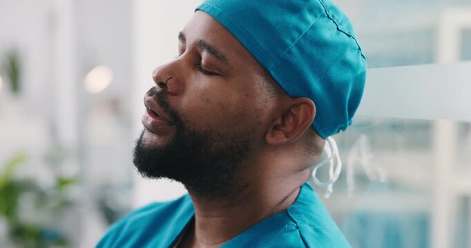 Upset, man and surgeon with stress on glass window for medical failure, bad news or mistake. Frustrated, male person or nurse with disappointment for surgical complication, grief or loss in hospital