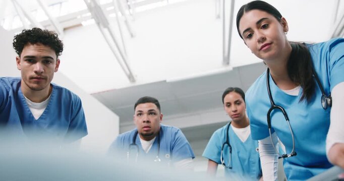 Stretcher, patient and nurses push with emergency for healthcare transport or transfer in hallway. People, medical team or moving gurney with face POV for clinic relocation, urgent care and low angle