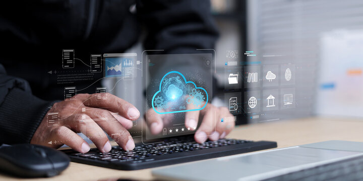 Close up man hand typing keyboard with digital cloud computing technology. Professional businessman managing online data storage, server security and database system.