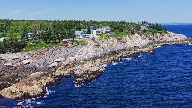 Aerial view of Pemaquid Point Lighthouse and rock ledges in Maine