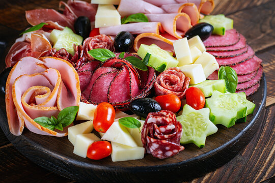 Holiday Appetizer Board with Salami, Ham, Prosciutto and Cheese