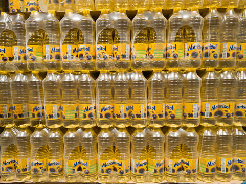Sibiu city, Romania - September 24 2026 a large stack of Marisol Sunflower Oil (1-liter plastic bottles) produced by Expur
