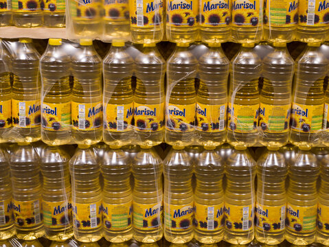 Sibiu city, Romania - September 24 2026 a large stack of Marisol Sunflower Oil (1-liter plastic bottles) produced by Expur