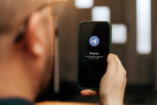 iPhone display with Telegram messaging and audio calling app
